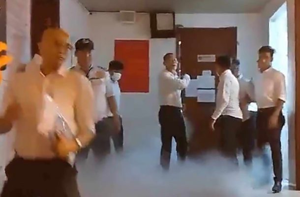 nhom doi tuong tan cong bao ve cua toa nha tai quan 7 anh 2